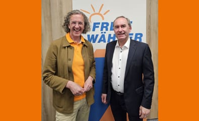 Foto mit Joachim Streit und Hubert Aiwanger vor FREIE WÄHLER Logo.